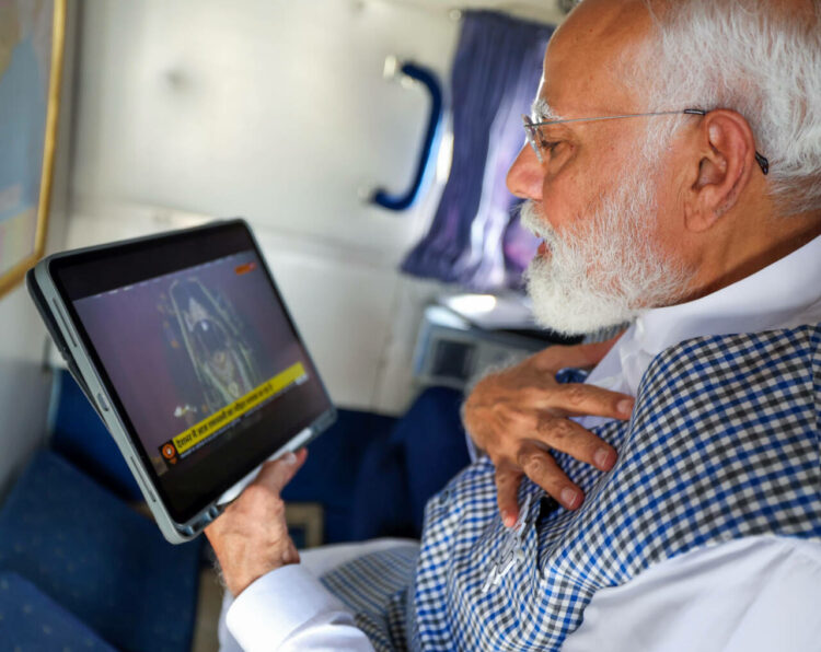 Nalbari, Apr 17 (ANI): Prime Minister Narendra Modi watches the Surya Tilak of Lord Ram Lalla at Ayodhya's Ram Janmabhoomi Temple on the occasion of Ram Navami, on Wednesday. (ANI Photo)