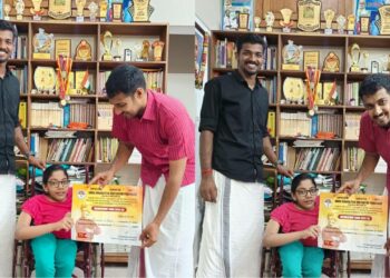 മീനാക്ഷിക്ക് എബിവിപി സംസ്ഥാന സെക്രട്ടറി
 ഇ. യു. ഈശ്വരപ്രസാദ് മെമ്പര്‍ഷിപ് നല്‍കുന്നു