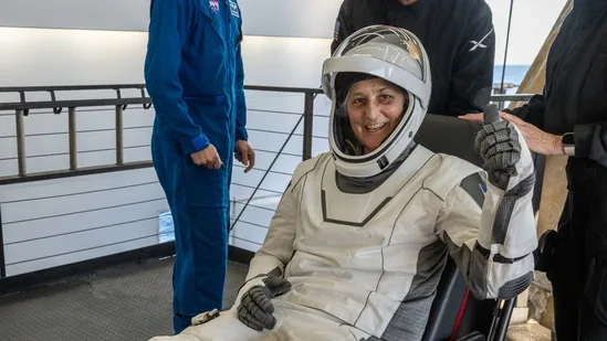 TOPSHOT - This photo provided by NASA shows NASA astronaut Suni Williams being helped out of a SpaceX Dragon spacecraft on board the SpaceX recovery ship MEGAN after he, NASA astronauts Suni Williams, Butch Wilmore, and Roscosmos cosmonaut Aleksandr Gorbunov landed in the water off the coast of Tallahassee, Florida, on March 18, 2025. (Photo by Keegan Barber / NASA / AFP) / RESTRICTED TO EDITORIAL USE - MANDATORY CREDIT "AFP PHOTO / NASA / Keegan Barber" - NO MARKETING NO ADVERTISING CAMPAIGNS - DISTRIBUTED AS A SERVICE TO CLIENTS